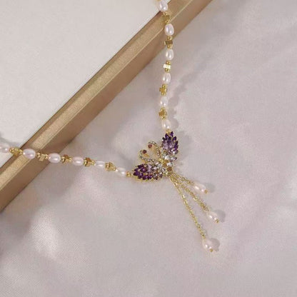 Sovlyn | Crystal Swan Pearl Bead Gold Chain Tassel Necklace