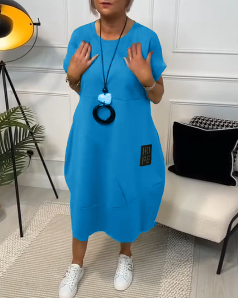 Rosabel | Relaxed Fit Balloon Hem Dress