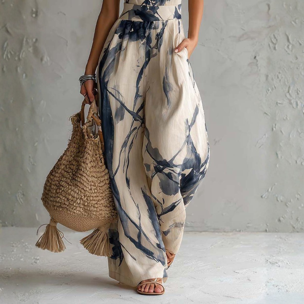 Emmeline | Flowing Halter Neck Statement Jumpsuit
